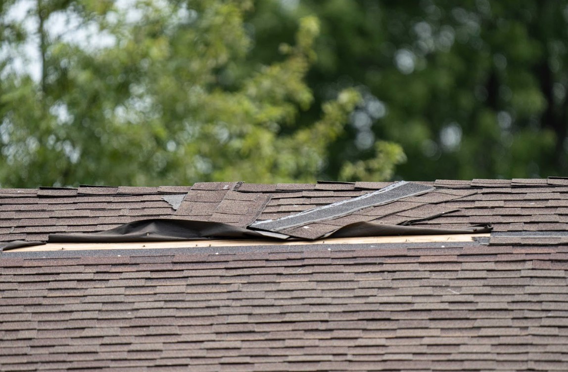 wind damages roof